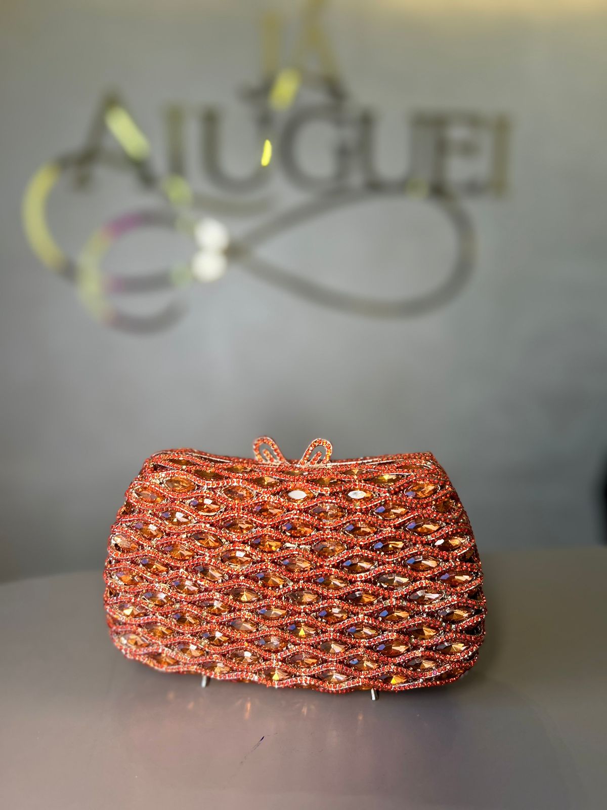 Clutch Reluzente laranja