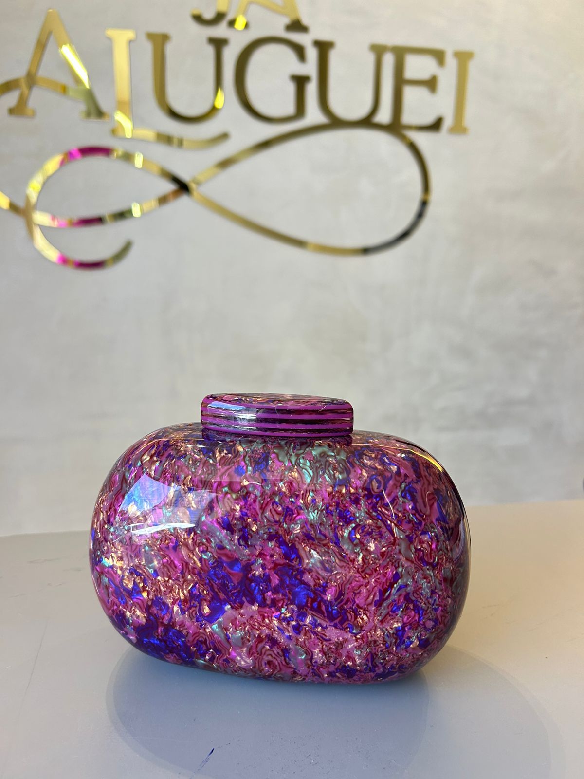 Clutch Psicodélica roxa