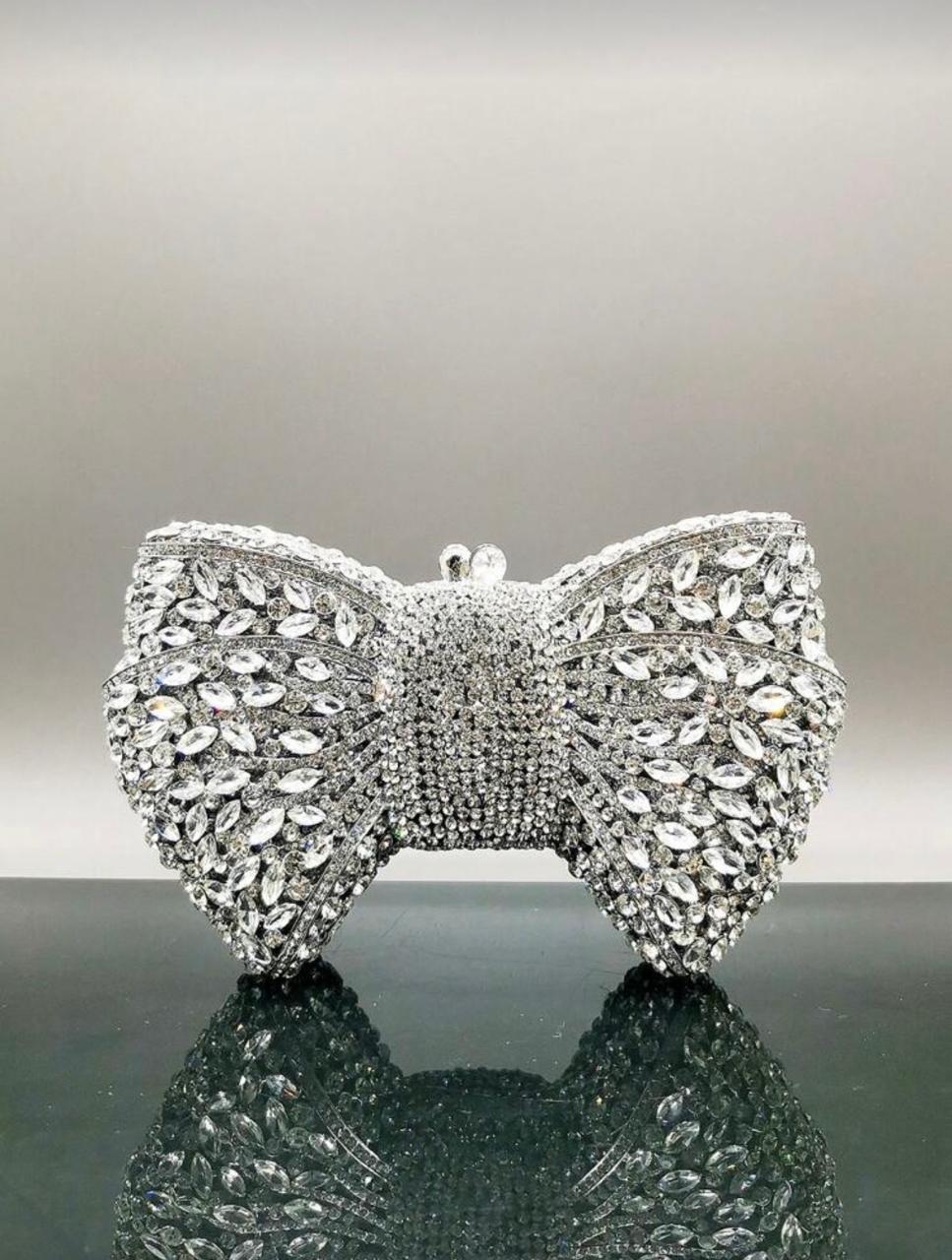 Clutch Prata pedraria formato em laço 